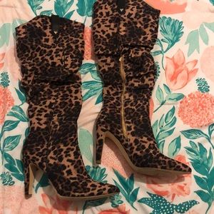 Leopard print knee length boots. 3” heel. Size 11